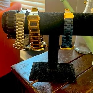 3 Michael Kors women’s watches and 1 Brighton brand